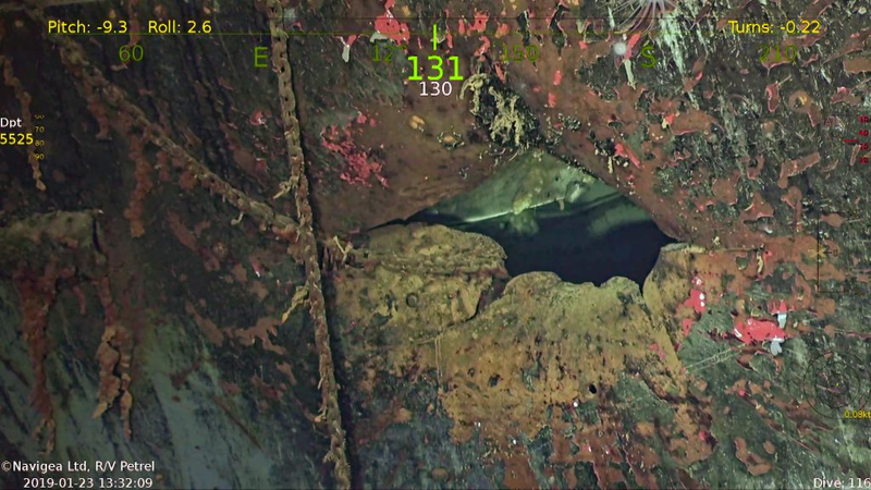 A hole in the hull of the sunken aircraft carrier.